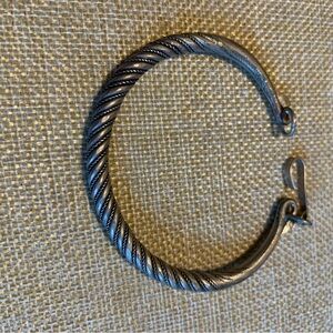 Vintage silver cable bracelet. I believe it’s sterling.